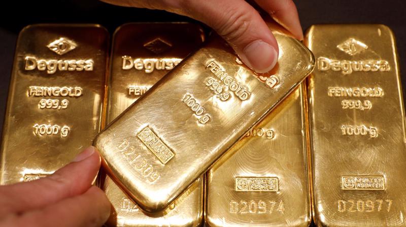 Đồng USD giảm giá mở đường cho giá vàng tăng - Ảnh: Getty/CNBC.