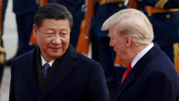 Chủ tịch Trung Quốc Tập Cận Bình (trái) và Tổng thống Mỹ Donald Trump trong chuyến thăm Bắc Kinh của ông Trump vào tháng 11/2017 - Ảnh: Reuters.