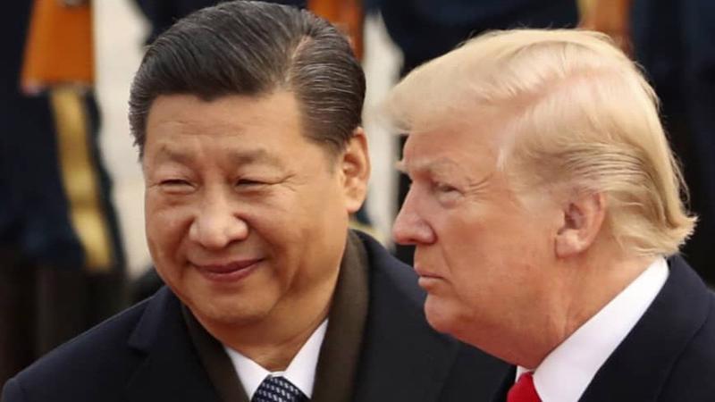 Chủ tịch Trung Quốc Tập Cận Bình (trái) và Tổng thống Mỹ Donald Trump - Ảnh: AP.