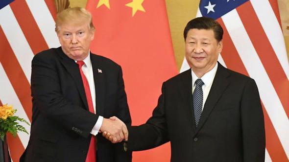 Tổng thống Mỹ Donald Trump (trái) và Chủ tịch Trung Quốc Tập Cận Bình trong một lần gặp.