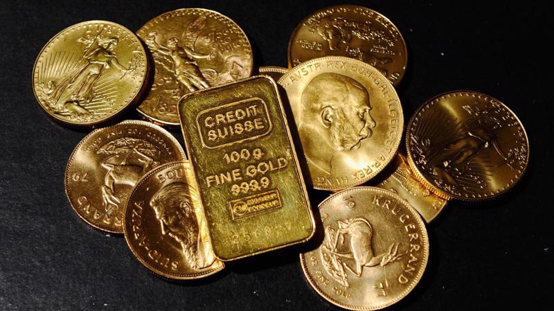 Giá vàng thế giới đang ở vùng đáy của 5 tuần do sức ép từ đồng USD mạnh - Ảnh: Reuters/CNBC.