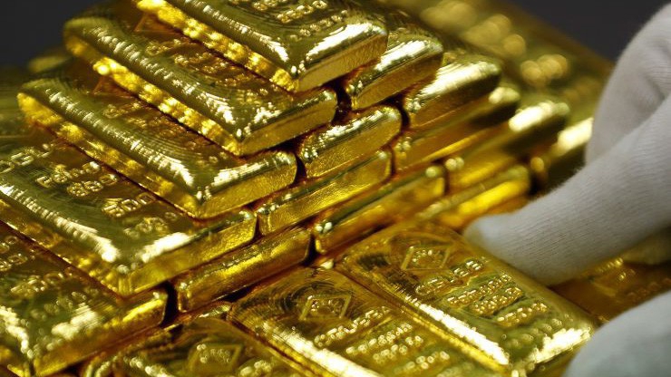 Vàng sụt giá do đồng USD tăng giá trở lại sau 5 ngày giảm liên tiếp - Ảnh: Reuters/CNBC.