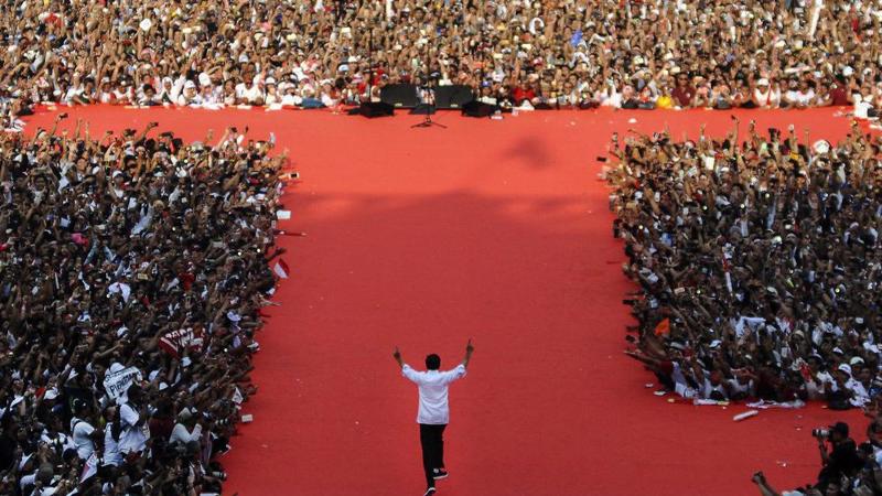 Tổng thống Jokowi trong một cuộc vận động tranh cử ở thủ đô Jakarta - Ảnh: Bloomberg.