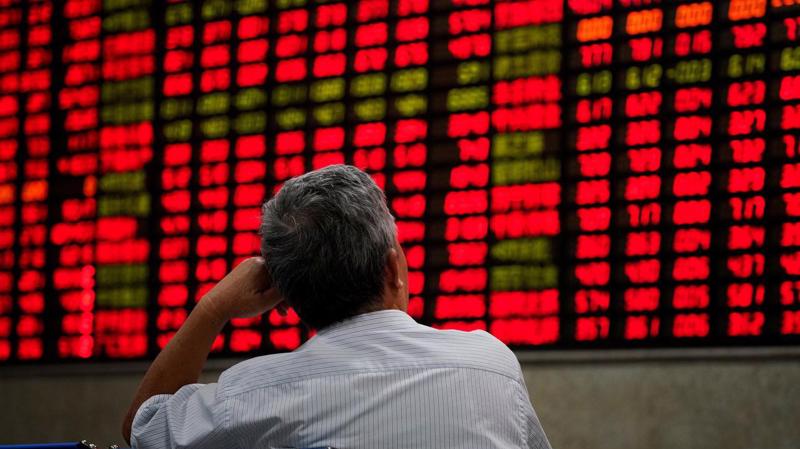 Giới đầu tư chứng khoán Trung Quốc đang giữ quan điểm thận trọng - Ảnh: Reuters.