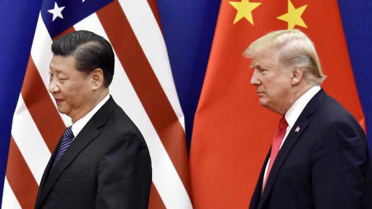 Chủ tịch Trung Quốc Tập Cận Bình (trái) và Tổng thống Mỹ Donald Trump trong một cuộc gặp vào năm 2017 - Ảnh: Reuters.