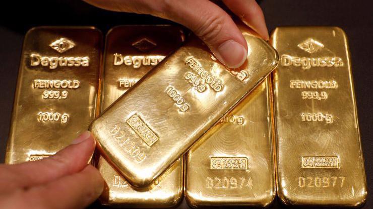 Mức giá hiện tại của vàng thế giới tương đương khoảng 39,6 triệu đồng/lượng - Ảnh: Reuters.