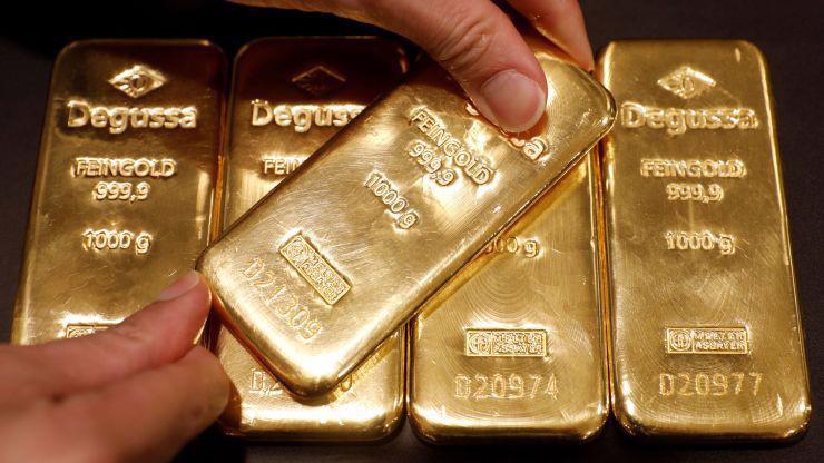 Tuần này, giá vàng thế giới đã tăng 1%, nâng tổng mức tăng trong 6 tuần lên 11% - Ảnh: Reuters.