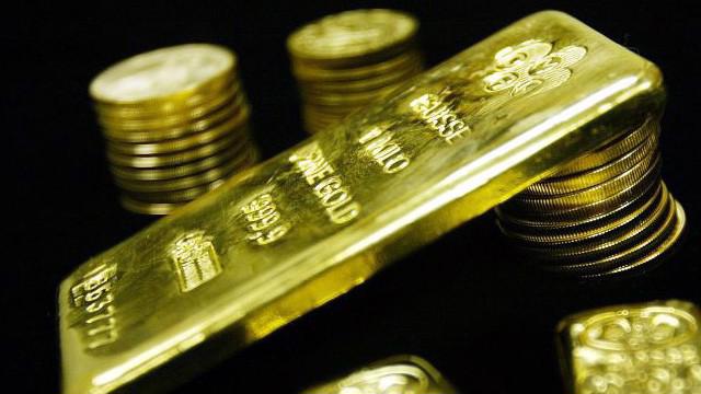 Giá vàng thế giới tăng mạnh do đồng USD giảm giá và nỗi lo mới về thương mại toàn cầu - Ảnh: Reuters/CNBC.