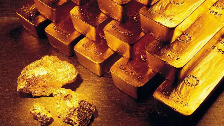 USD mạnh lên khiến vàng khó tái lập mốc giá 1.400 USD/oz - Ảnh: Stockbyte/CNBC.
