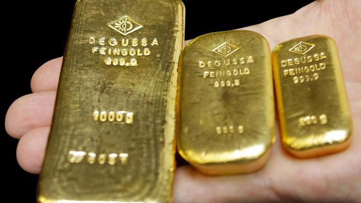 Từ đầu tuần, giá vàng thế giới đã tăng 0,6% nhờ dự báo FED sắp hạ lãi suất - Ảnh: AP/CNBC.