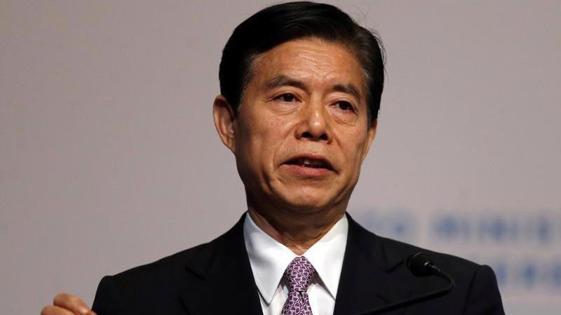Bộ trưởng Bộ Thương mại Trung Quốc, ông Chung Sơn - Ảnh: Reuters.