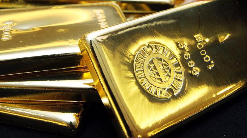 Nhu cầu mua vàng phòng ngừa rủi ro trên thị trường quốc tế đang ở mức cao - Ảnh: Reuters.