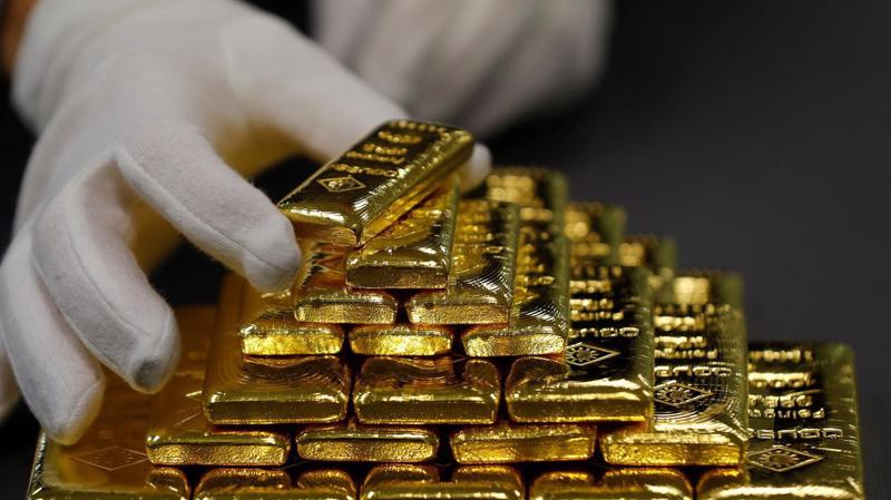 Giá vàng thế giới đã tăng 18% trong năm nay - Ảnh: Reuters.