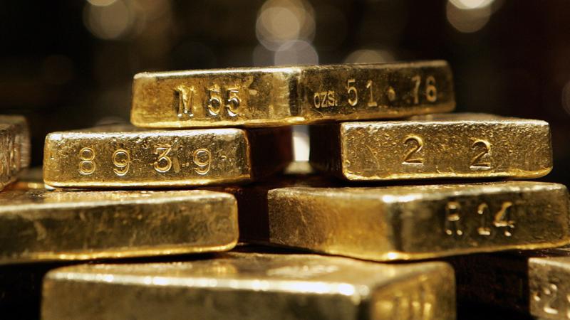 Giá vàng thế giới đang ở vùng cao nhất gần 3 tuần - Ảnh: Reuters.
