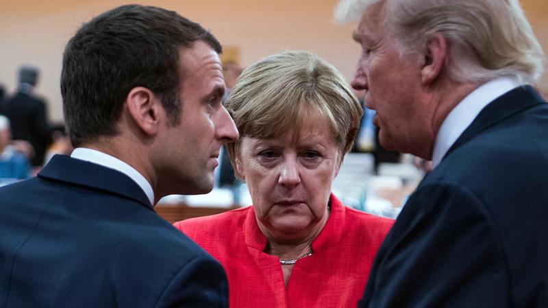 Từ trái qua: Tổng thống Pháp Emmanuel Macron, Thủ tướng Đức Angela Merkel, và Tổng thống Mỹ Donald Trump - Ảnh: Getty.