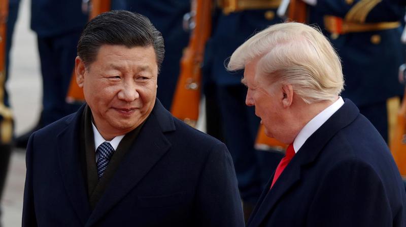 Chủ tịch Trung Quốc Tập Cận Bình (trái) và Tổng thống Mỹ Donald Trump - Ảnh: Reuters.