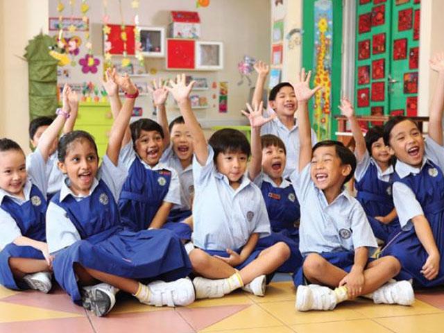 Các em học sinh trong một trường tiểu học ở Singapore.<br>