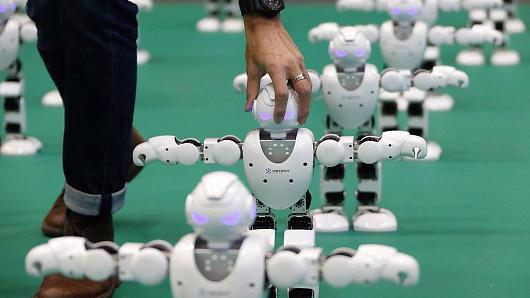 Những con robot của Trung Quốc trong một triển lãm người máy ở Nhật Bản vào cuối năm 2016 - Ảnh: Bloomberg.<br>