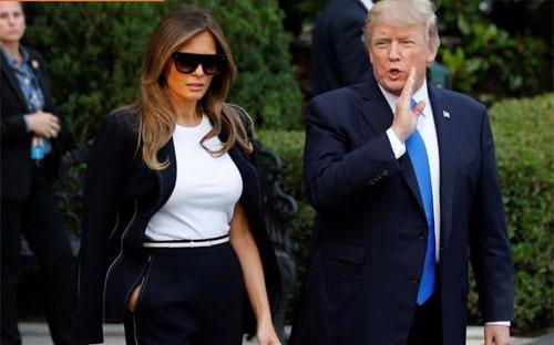 Tổng thống Mỹ Donald Trump và phu nhân Melania Trump tại&nbsp; Washington ngày 12/7 - Ảnh: Reuters.<br>