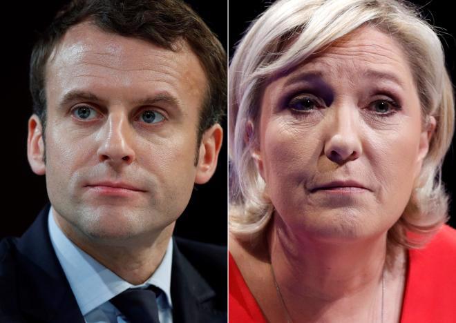 Hai ứng cử viên chiến thắng trong vòng 1 bầu cử Tổng thống Pháp: ông Emmanuel Macron (trái) và bà Marine Le Pen.<br>
