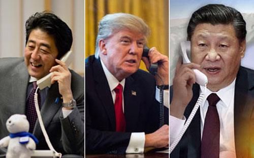Từ trái qua: Thủ tướng Nhật Bản Shinzo Abe, Tổng thống Mỹ Donald Trump, và Chủ tịch Trung Quốc Tập Cận Bình - Ảnh: Kyodo.<br>