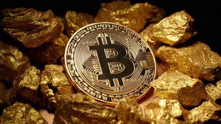 JPMorgan dự báo trong dài hạn, Bitcoin có thể cạnh tranh với vàng như một công cụ đầu tư - Ảnh: Getty Images