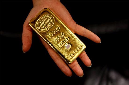 Nếu giảm cùng biên độ với giá vàng thế giới đêm qua, thì giá vàng trong nước sáng nay phải “bốc hơi” khoảng 450.000 đồng/lượng - Ảnh: Getty.