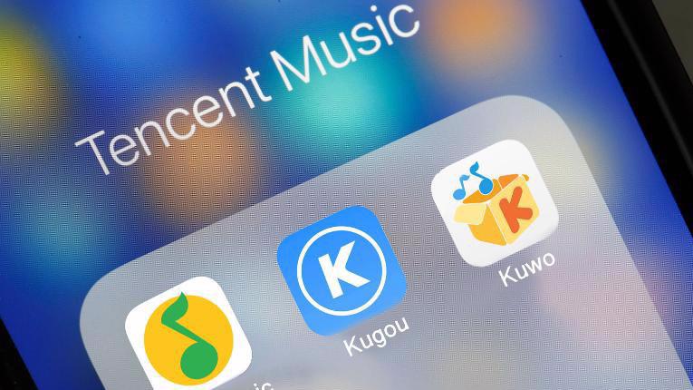 Dịch vụ âm nhạc của Tencent gồm QQ Music, Kugou và Kuwo - Ảnh: Getty Images.