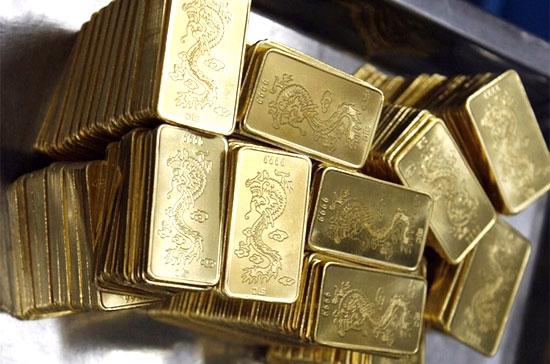 Giá vàng đã biến động mạnh và không rõ xu hướng trong cả tuần do tâm lý chưa thực sự ổn định của giới đầu tư - Ảnh: Reuters.