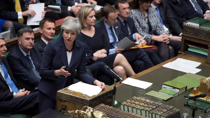Thủ tướng Anh Theresa May phát biểu tại Hạ viện nước này ngày 27/3 - Ảnh: Reuters.