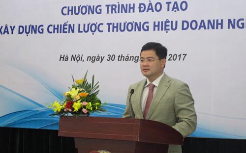 Ông Bùi Huy Sơn, Cục trưởng Cục Xúc tiến thương mại phát biểu khai mạc chương trình đào tạo, xây dựng chiến lược thương hiệu doanh nghiệp.