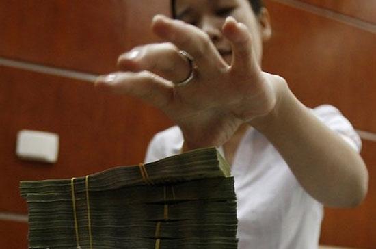 Tính chung, lượng vốn “bơm” ròng trong 3 tuần qua đạt 8.545 tỷ đồng - Ảnh: Reuters.