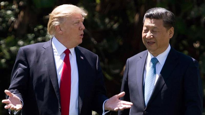 Tổng thống Mỹ Donald Trump (trái) và Chủ tịch Trung Quốc Tập Cận Bình - Ảnh: Getty.