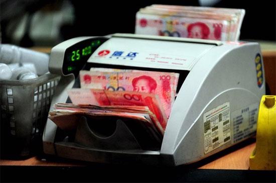 Theo giới phân tích, sự tăng giá của Nhân dân tệ thời gian qua sẽ hạn chế mức tăng giá của đồng tiền này so với USD trong trường hợp Bắc Kinh thực hiện điều chỉnh tỷ giá - Ảnh: Getty.
