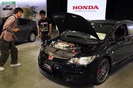 Nhu cầu tiêu thụ ô tô và xe máy của Honda tăng vọt - Ảnh: AP.