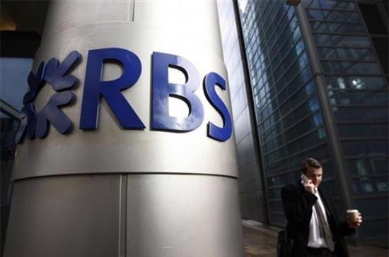 Phía trước trụ sở của RBS tại London, Anh. Quyết định công bố ngày 3/11 của EC yêu cầu RBS phải bán lại 318 chi nhánh - Ảnh: AP.