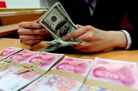 Dự trữ ngoại hồi của Trung Quốc giảm 20,5 tỷ USD do thặng dư thương mại của Trung Quốc giảm.