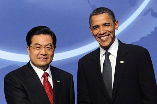 Chủ tịch Trung Quốc (trái) và Tổng thống Mỹ bên lề Hội nghị An ninh hạt nhân - Ảnh: Getty.
