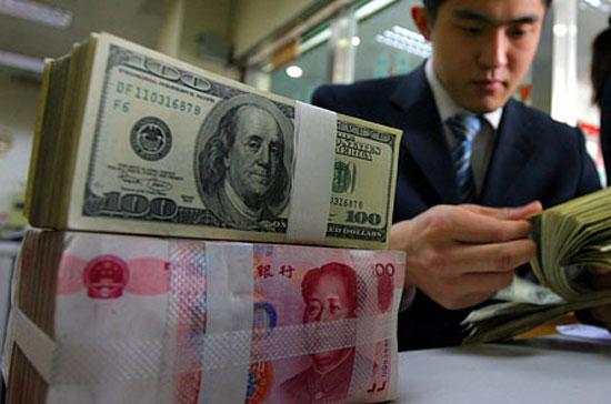 Theo hãng tin Reuters, Trung Quốc có thể hãm tốc độ tăng tỷ giá trong năm tới.