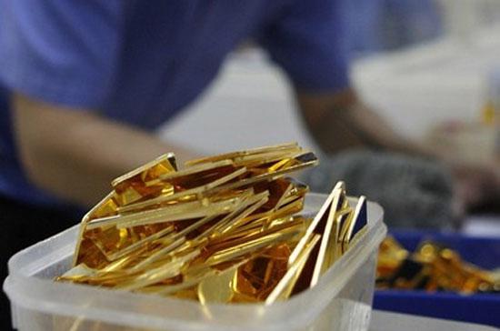 Liên tục tăng giá từ đầu tuần tới nay, giá vàng trong nước hiện đã đội thêm xấp xỉ 600.000 đồng/lượng và đang có khả năng lấy lại mốc 28 triệu đồng/lượng - Ảnh: Reuters.