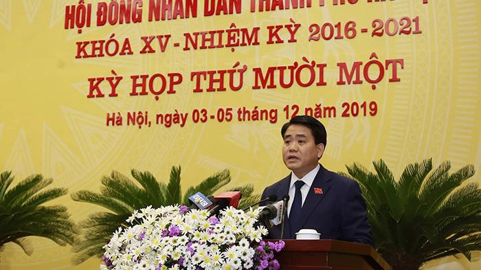 Chủ tịch UBND thành phố Hà Nội Nguyễn Đức Chung phát biểu trước Hội đồng Nhân dân chiều 5/12.