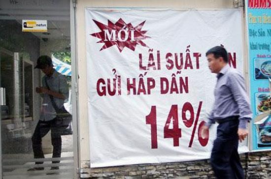 Trần lãi suất huy động VND 14%/năm được áp từ tháng 3/2011 đến nay, nhưng nhiều yếu tố của thị trường hiện đã thay đổi - Ảnh: Saigon Times.
