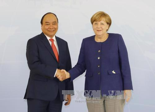 Thủ tướng Đức Angela Merkel tiếp Thủ tướng Việt Nam Nguyễn Xuân Phúc tối 6/7 - Ảnh: TTXVN.<b><br></b>