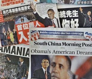 Nhiều tờ báo trên thế giới đã đăng tải thông tin về chiến thắng của ông Obama trong cuộc đua vào Nhà Trắng - Ảnh: AFP.