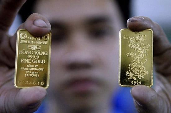 Nếu tăng giảm cùng tốc độ với giá vàng thế giới, thì giá vàng trong nước sáng nay đã phải lên tới mức 29,10 triệu đồng/lượng - Ảnh: Reuters.