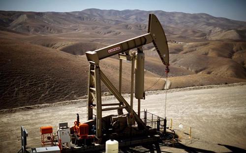 Giàn khai thác dầu đá phiến của Mỹ - Ảnh: Reuters.