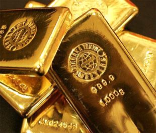 Đồng USD giảm giá tiếp tục là nhân tố hỗ trợ mạnh cho giá vàng - Ảnh: Bloomberg.
