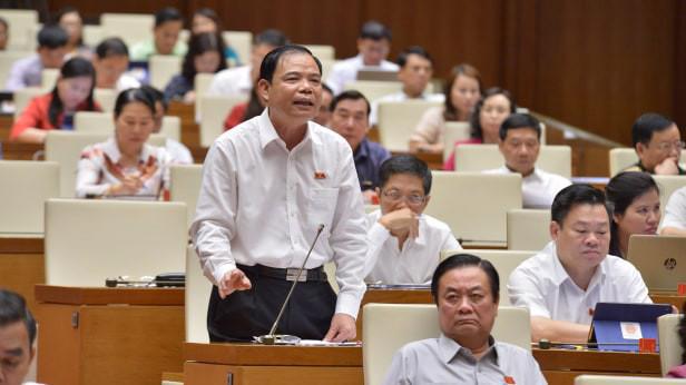 Bộ trưởng Bộ Nông nghiệp và phát triển nông thôn Nguyễn Xuân Cường phát biểu tại nghị trường - Ảnh: Quang Phúc 