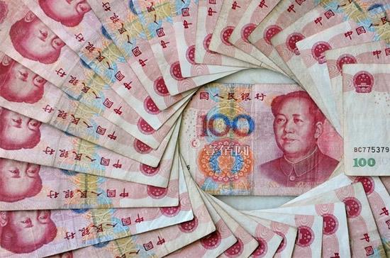Theo một số phân tích, việc Trung Quốc tổ chức cuộc điều tra để xác định ảnh hưởng trong trường hợp tỷ giá đồng Nhân dân tệ được điều chỉnh tăng là một bằng chứng cho thấy Bắc Kinh đang xem xét lựa chọn thực hiện điều chỉnh tỷ giá - Ảnh: Getty Images.