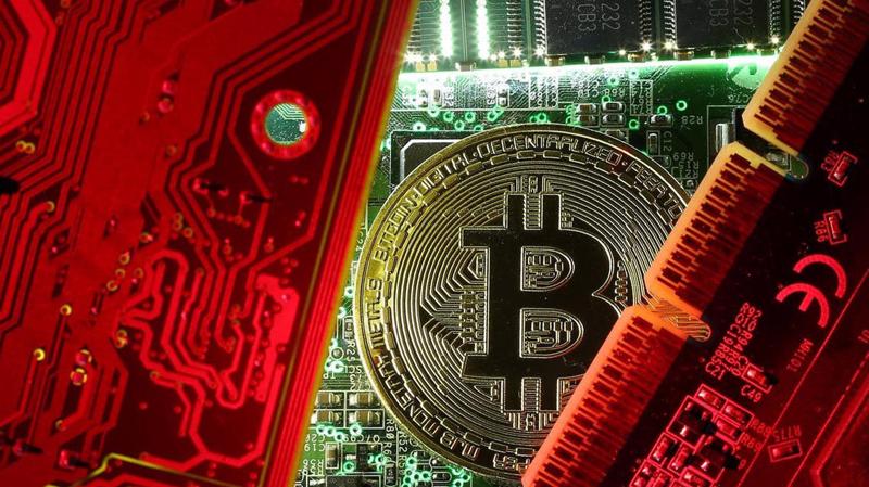 Bitcoin nguồn cung giới hạn 21 triệu đồng - Ảnh: Getty Images